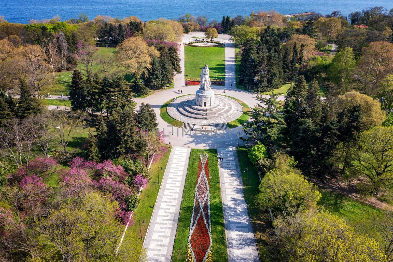 Aerial view of the decorated sea garden and The Pantheon of the Fallen of the Wars 