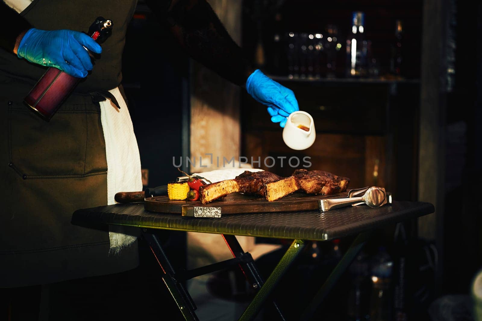 the flesh of an animal especially a mammal as food. Ready tasty rib meat grilled on a cutting board before serving.