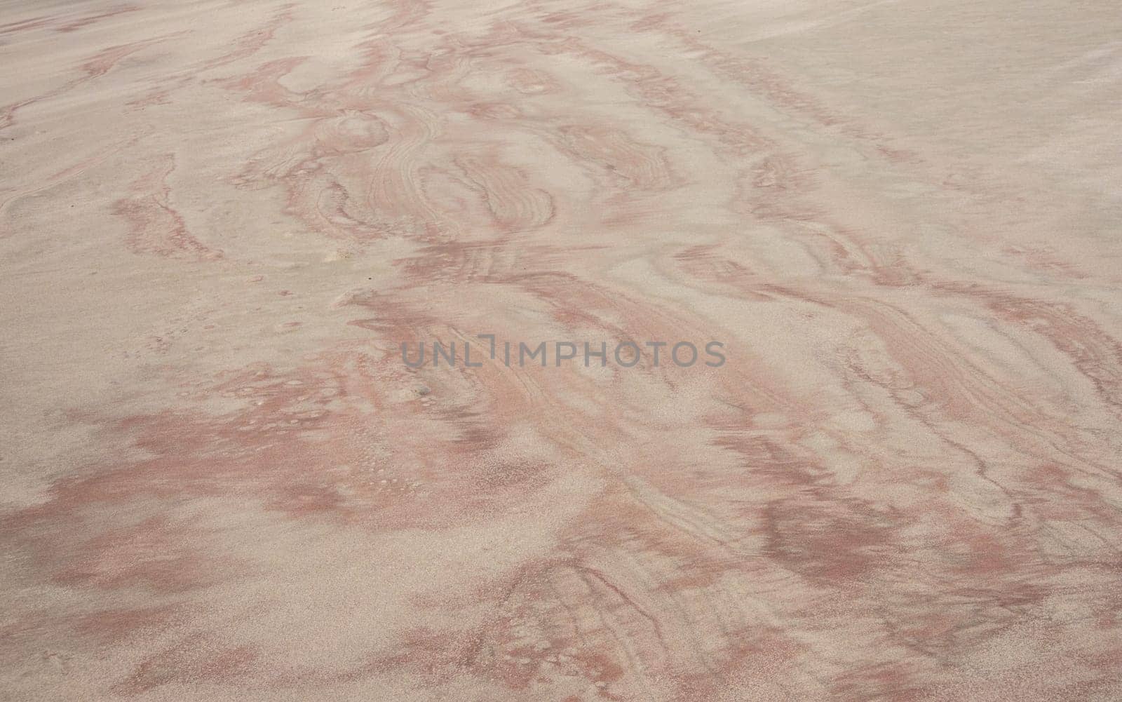 Different colors and shades in a sandy beach on Falkland Islands