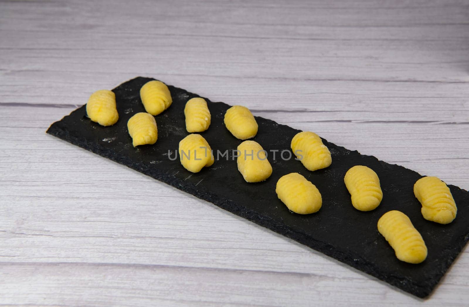 Pile of yellow eggs gnocchi Gnocci potato peru italian food, High quality photo