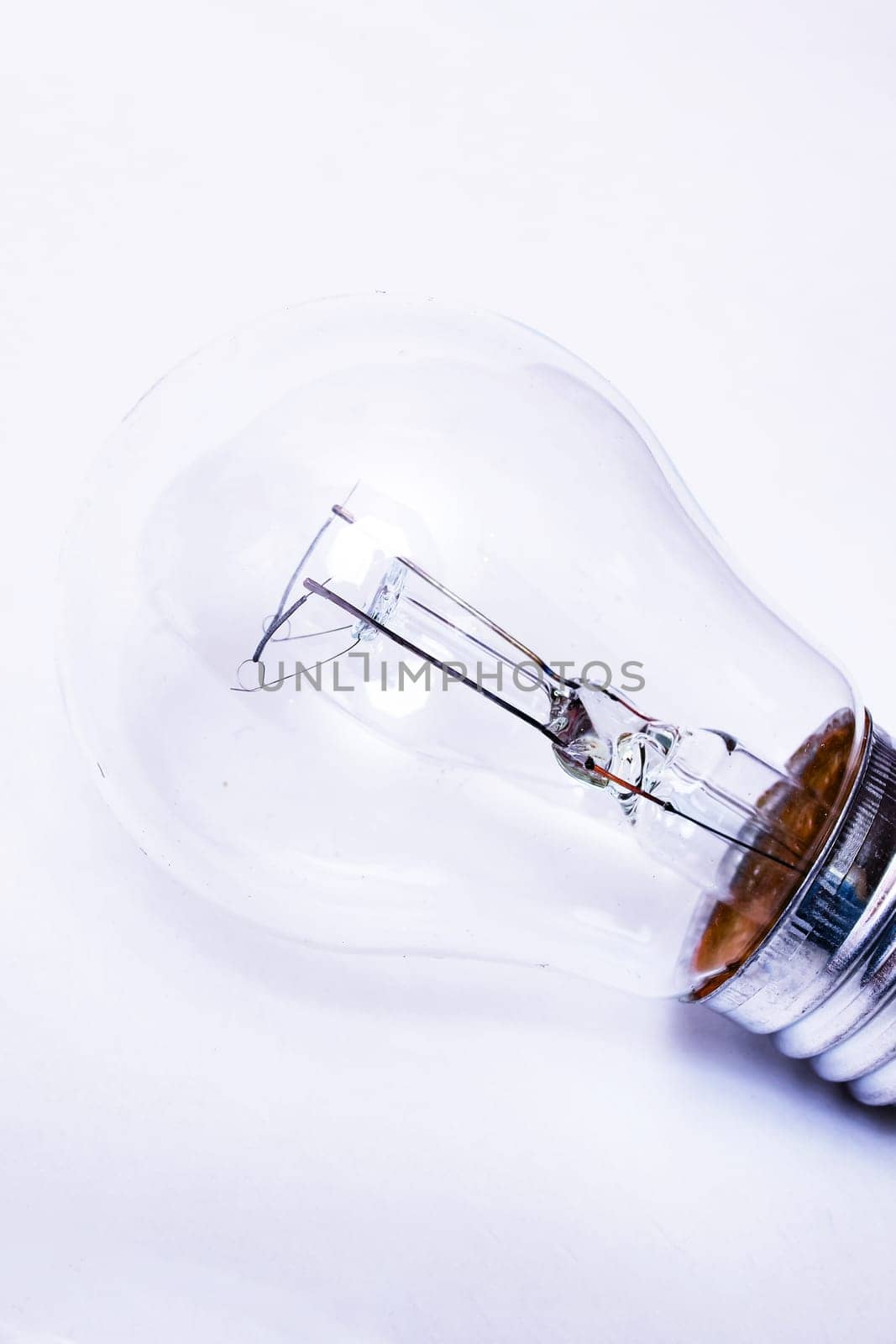 Old light bulb on a gray background by Vera1703