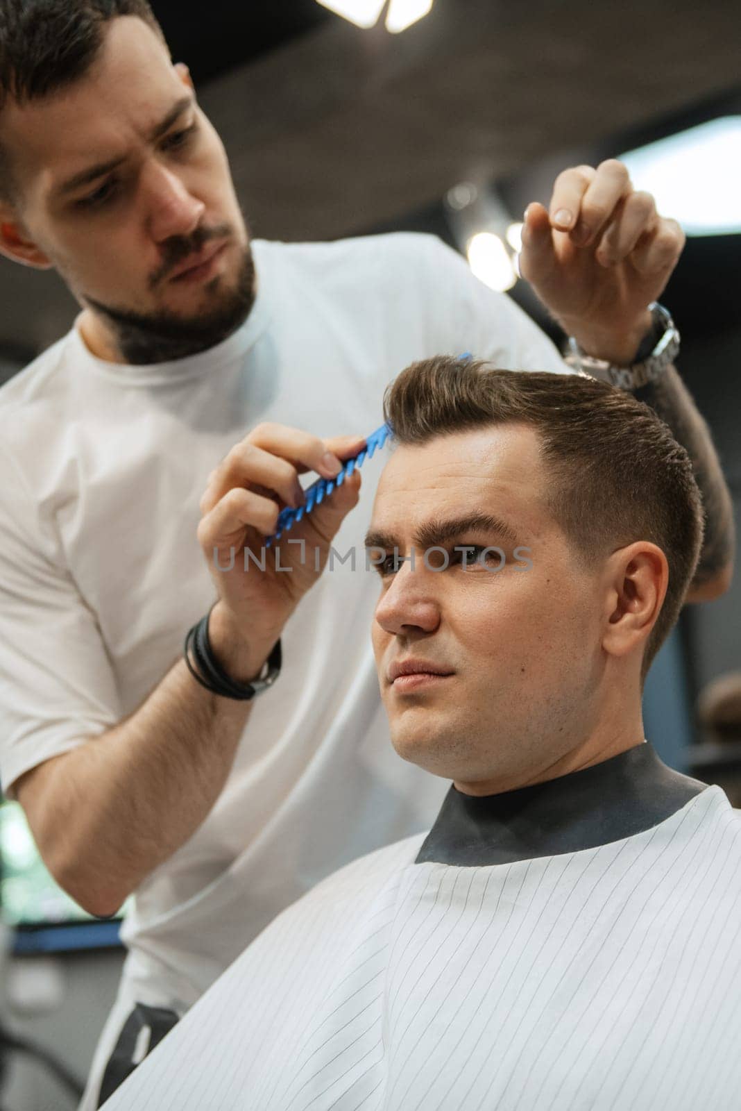 morning of the groom in the barber shop