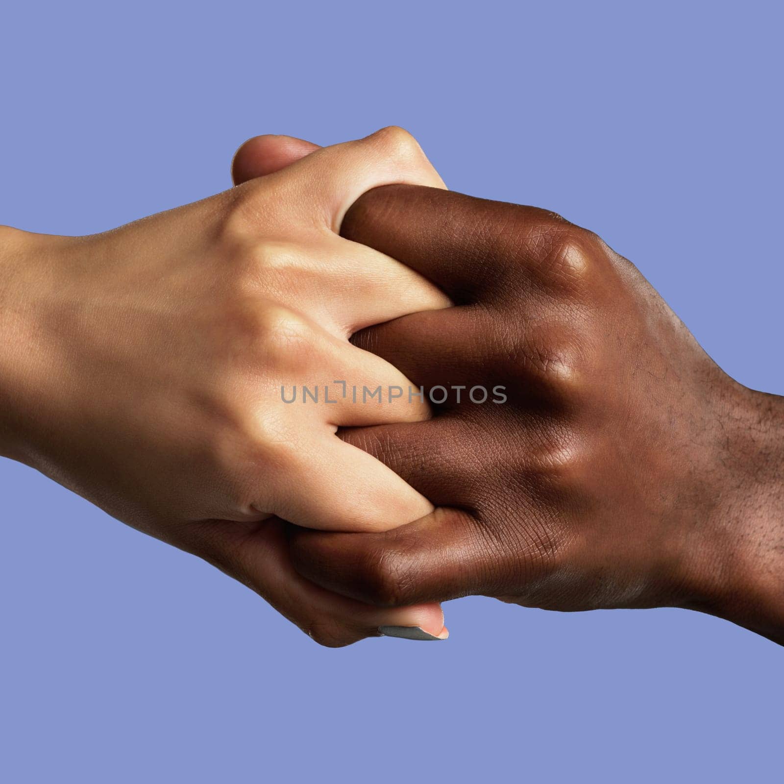 Hands, partnership and different with a collaboration of people in studio on a blue background for support. Fingers, linked and grip with friends joined together in unity, diversity or solidarity.