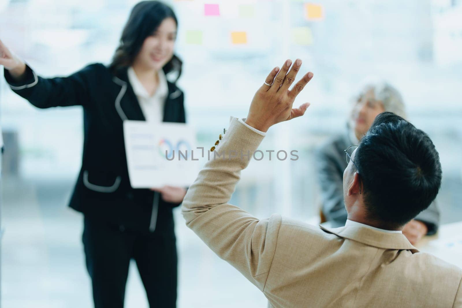 Asian entrepreneurs and business people meeting in a conference room in business planning, financial budget and investment risk assessment to analyze customer groups to increase company growth by Manastrong