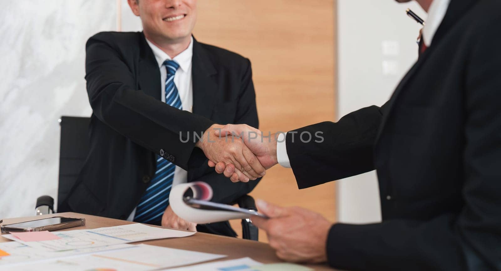 Business handshake for teamwork of business merger and acquisition, successful negotiate, businessman shake hand with partner to celebration partnership and business deal concept by nateemee