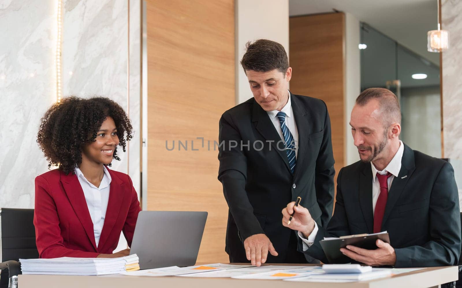 Business team Diverse colleagues gather brainstorm discuss financial statistics at office meeting. finance, teamwork ,data Graphs Charts concept.