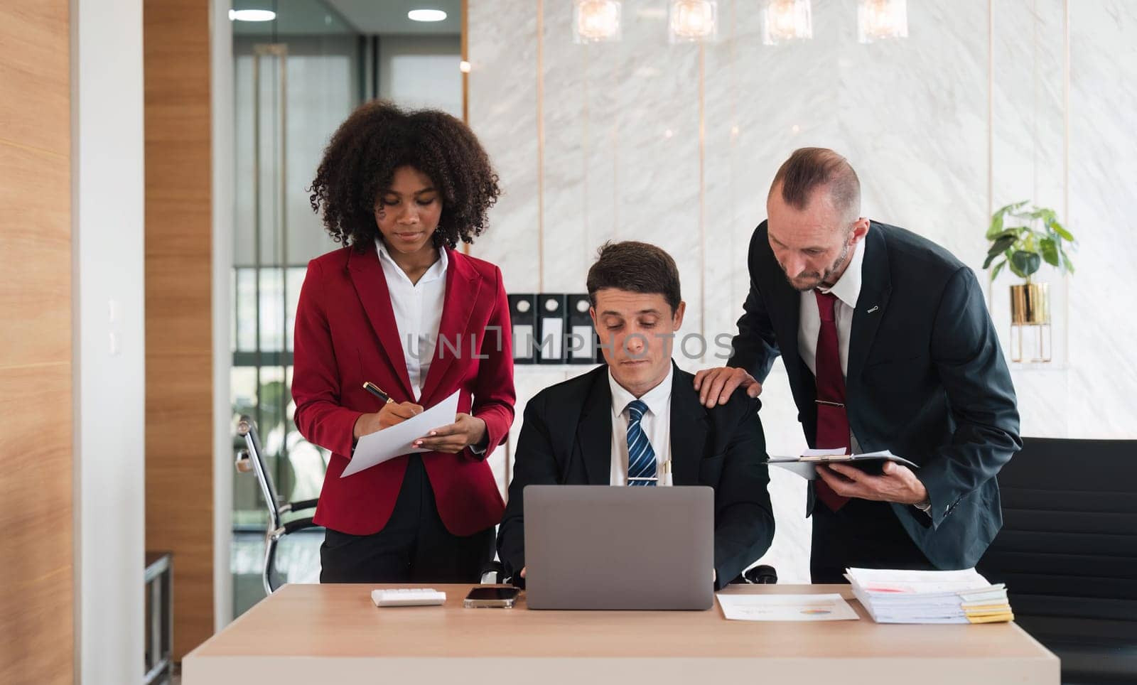 Business team Diverse colleagues gather brainstorm discuss financial statistics at office meeting. finance, teamwork ,data Graphs Charts concept.