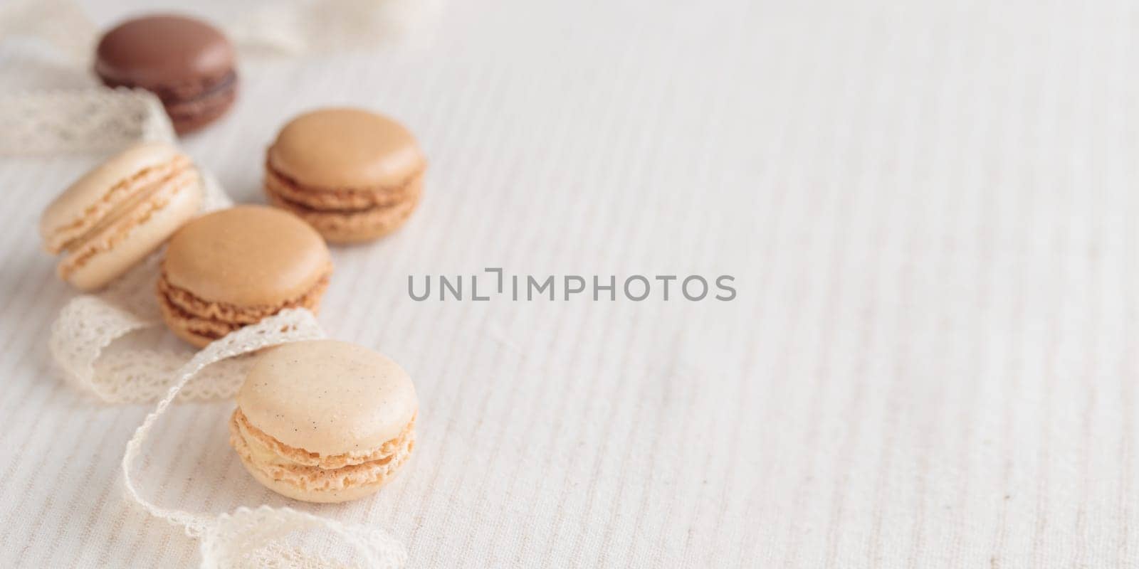 Colorful pastel eco handmade natural macaroons on white background. Gift for 8 March, International Women's Day, Valentine Day. Horizontal banner closeup with a copyspace