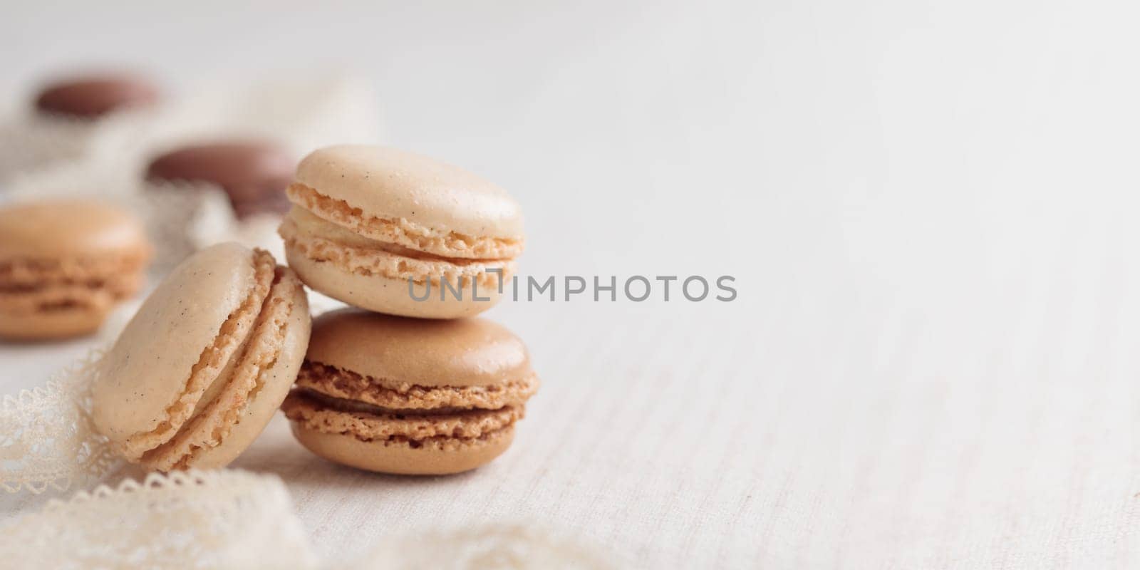 Colorful pastel eco handmade natural macaroons on white background. Gift for 8 March, International Women's Day, Valentine Day. Horizontal banner closeup with a copyspace