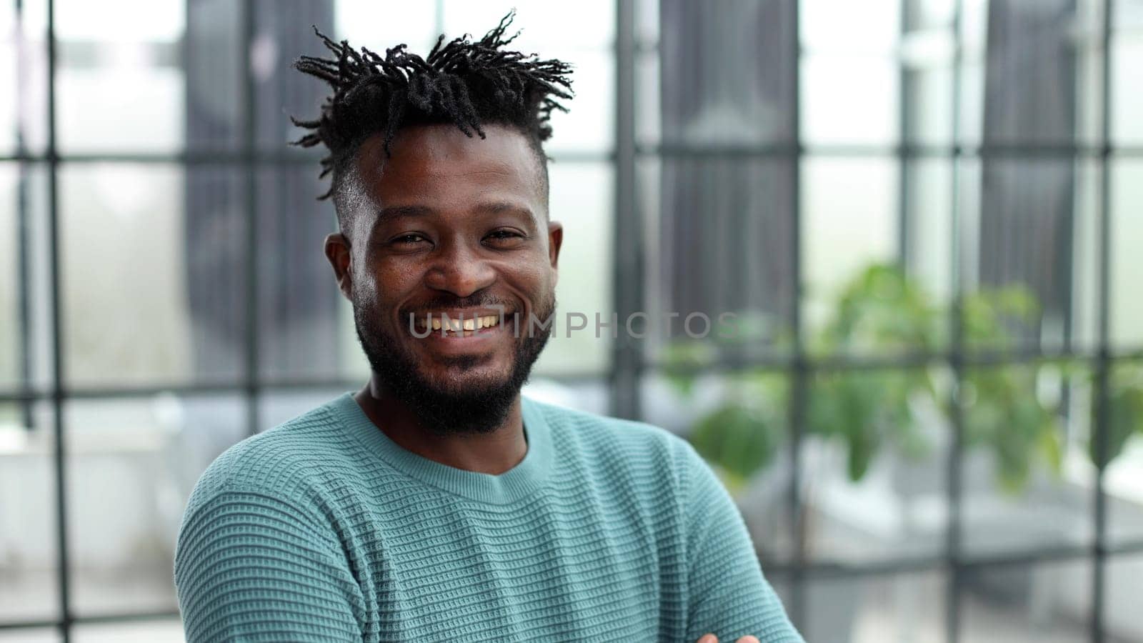 young adult african american ethnicity man looking at camera