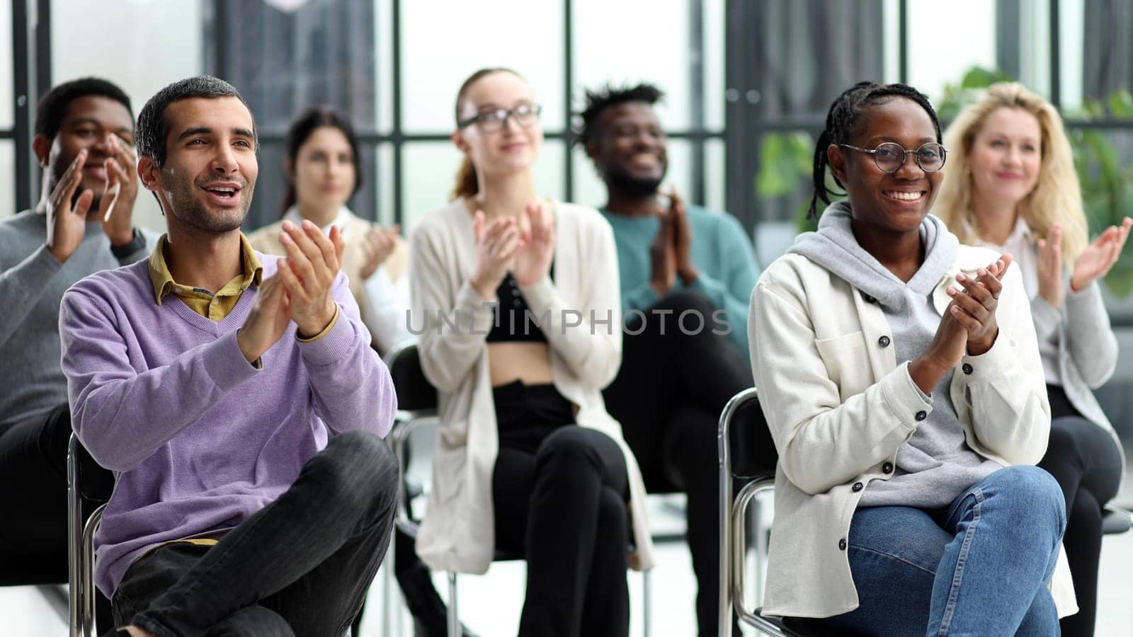 Audience Applauding a Great Speaker at Business convention and Presentation
