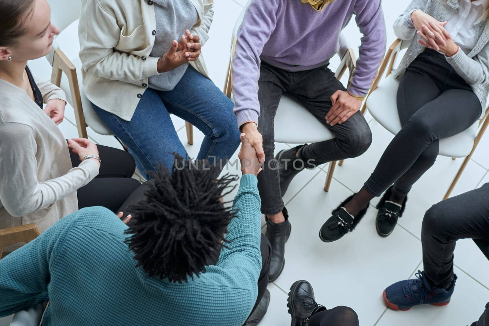 Businessmen shaking hands after agreement done