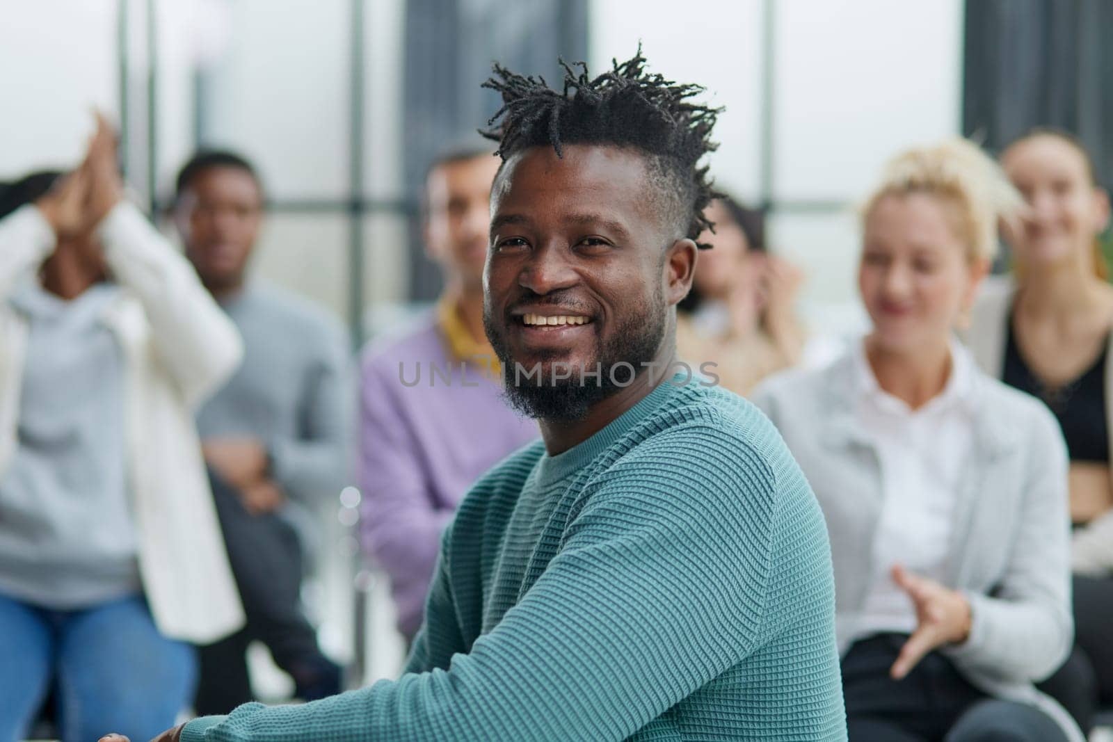 Several ethnic groups share ideas while sitting in an office