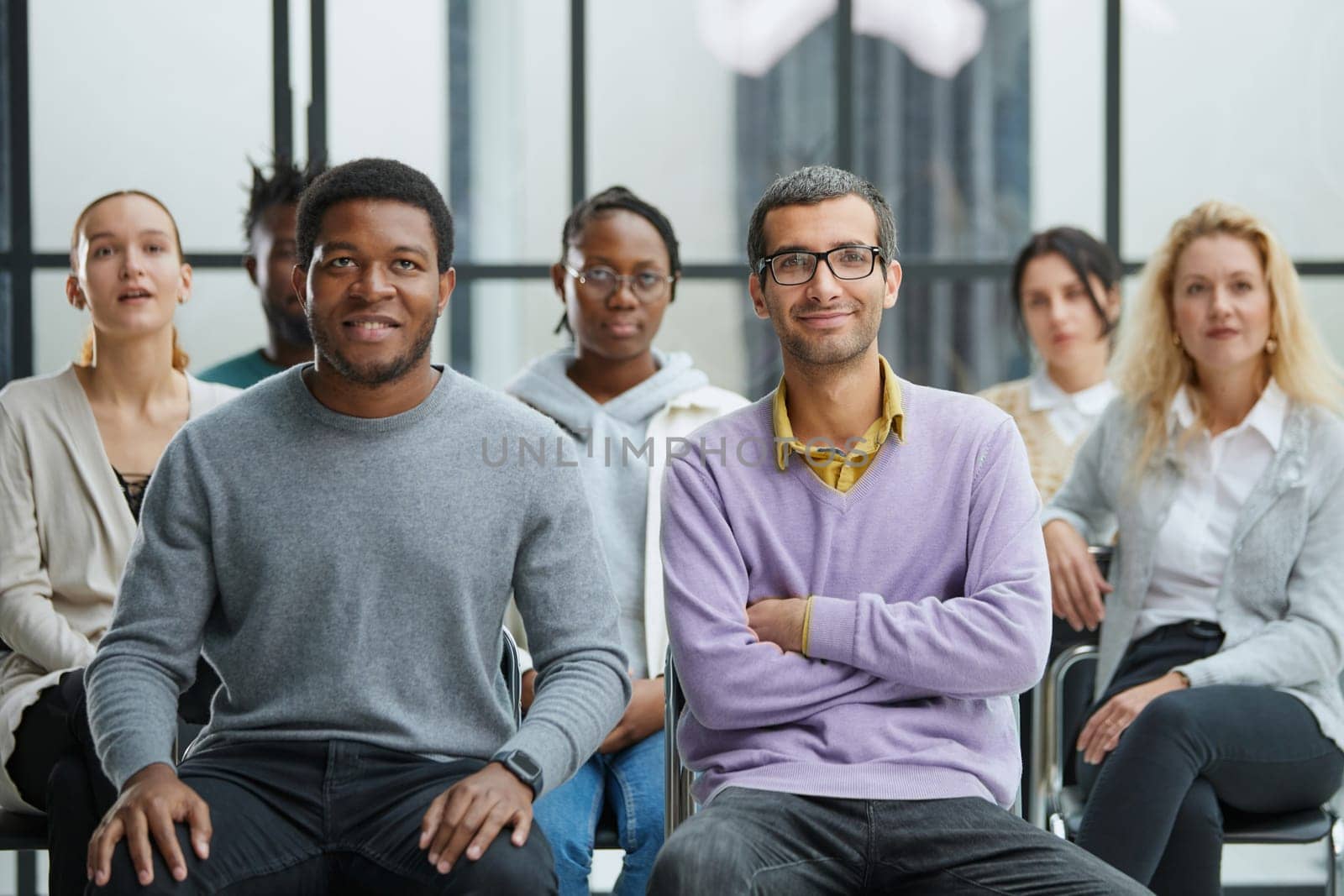 young business people listening to a lecture in the conference hall.
