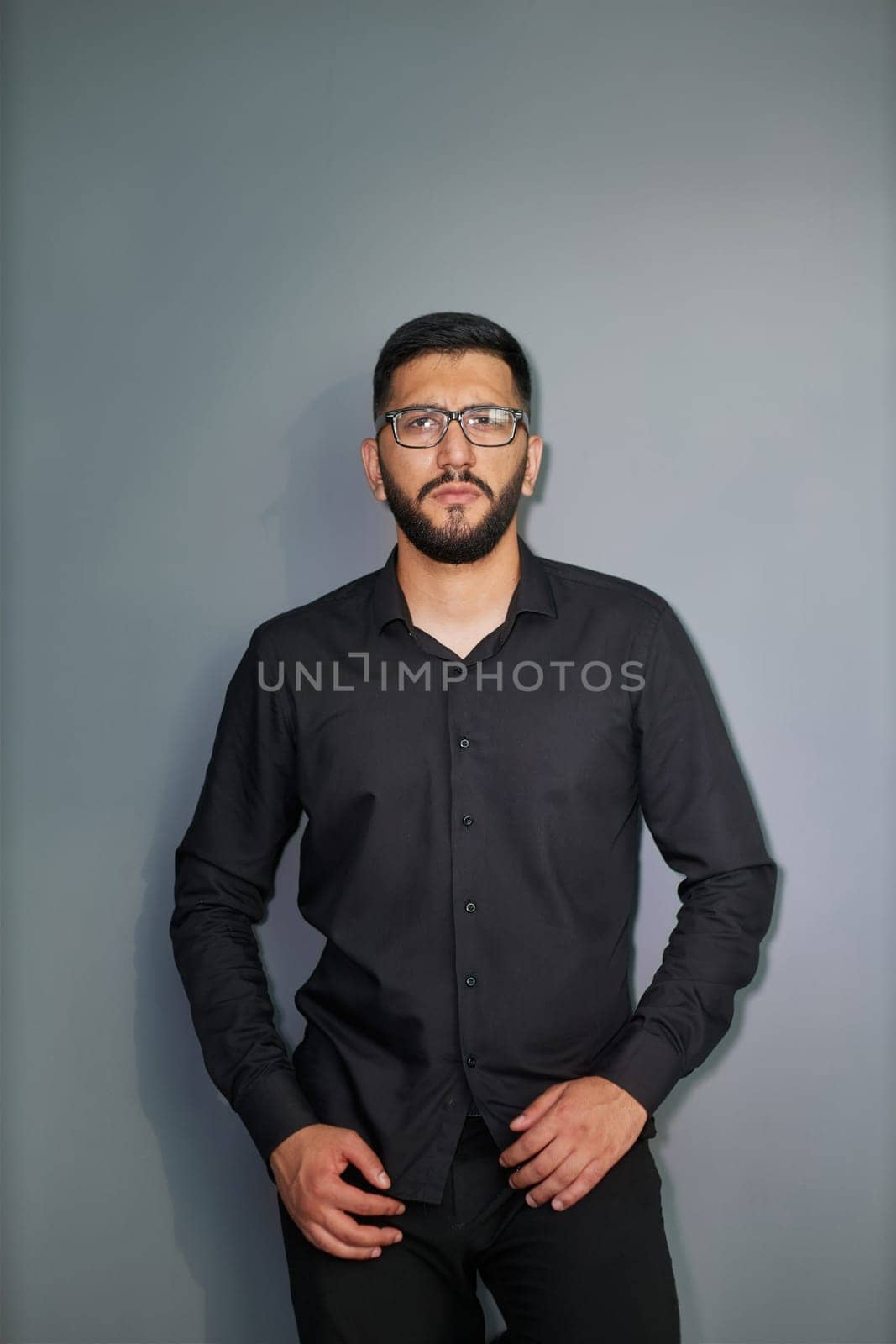 Business Concept - Portrait Handsome Business man holding hands with confident face. White Background