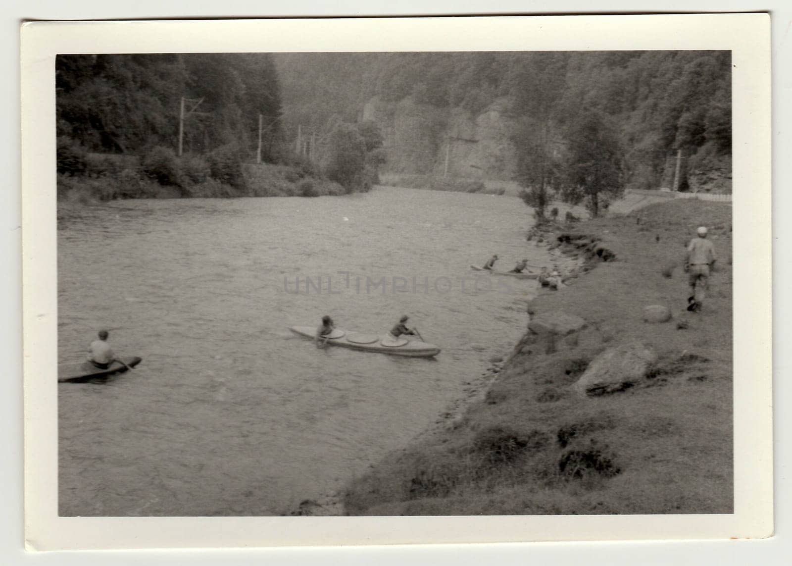 THE CZECHOSLOVAK SOCIALIST REPUBLIC - CIRCA 1980s: Vintage photo shows young canoeists on the river.