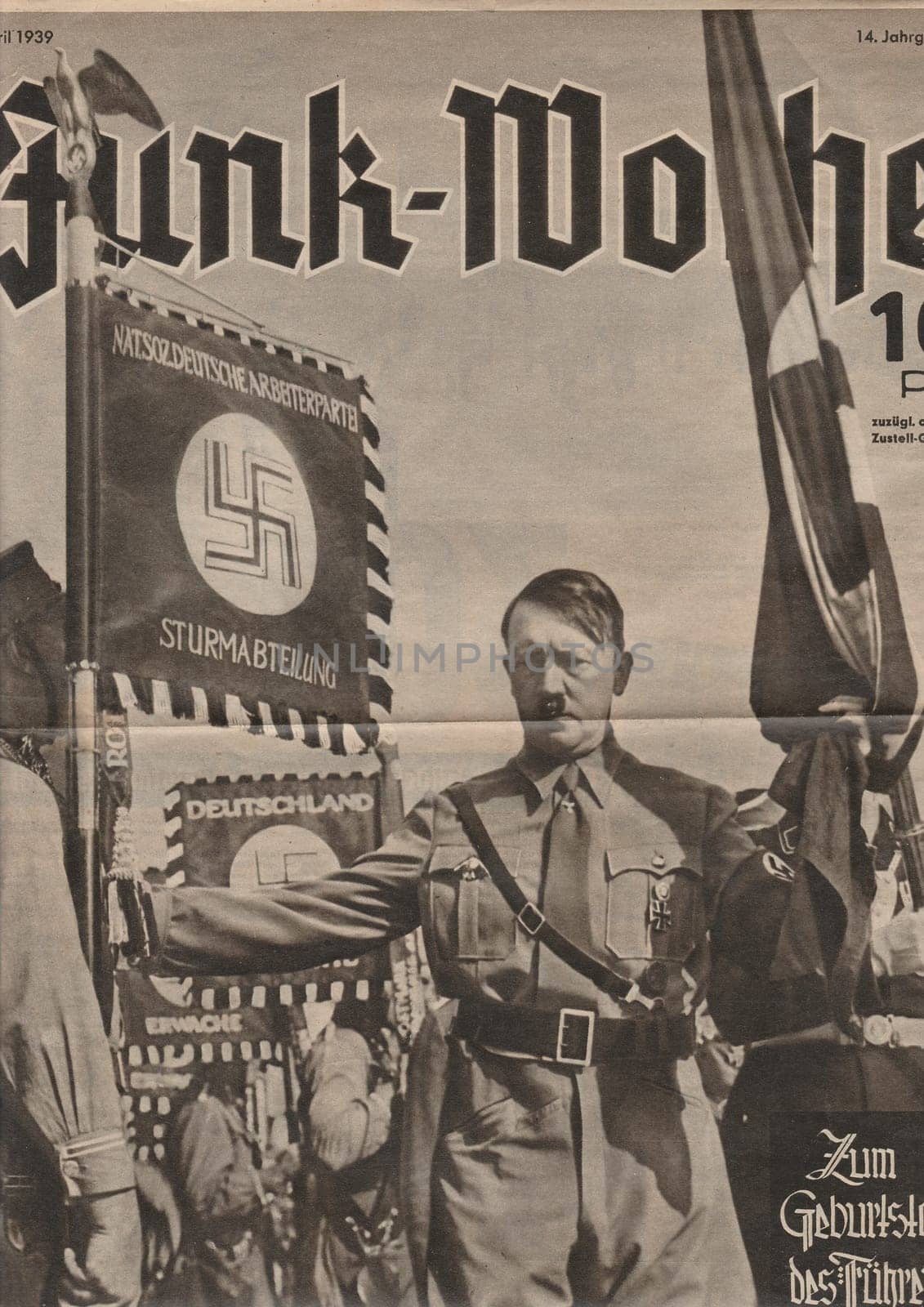 Reproduction of magazine page shows Adolf Hitler. by roman_nerud