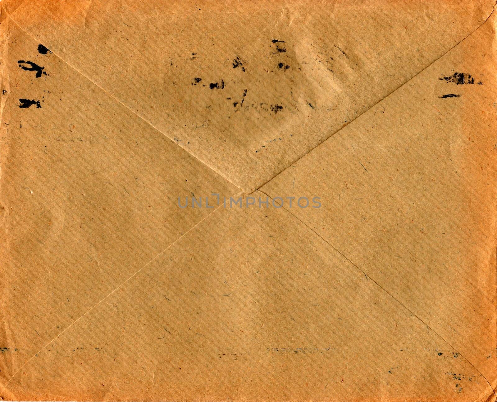 Back of an old used envelope. Rich stain and paper details. Can be used as background by roman_nerud