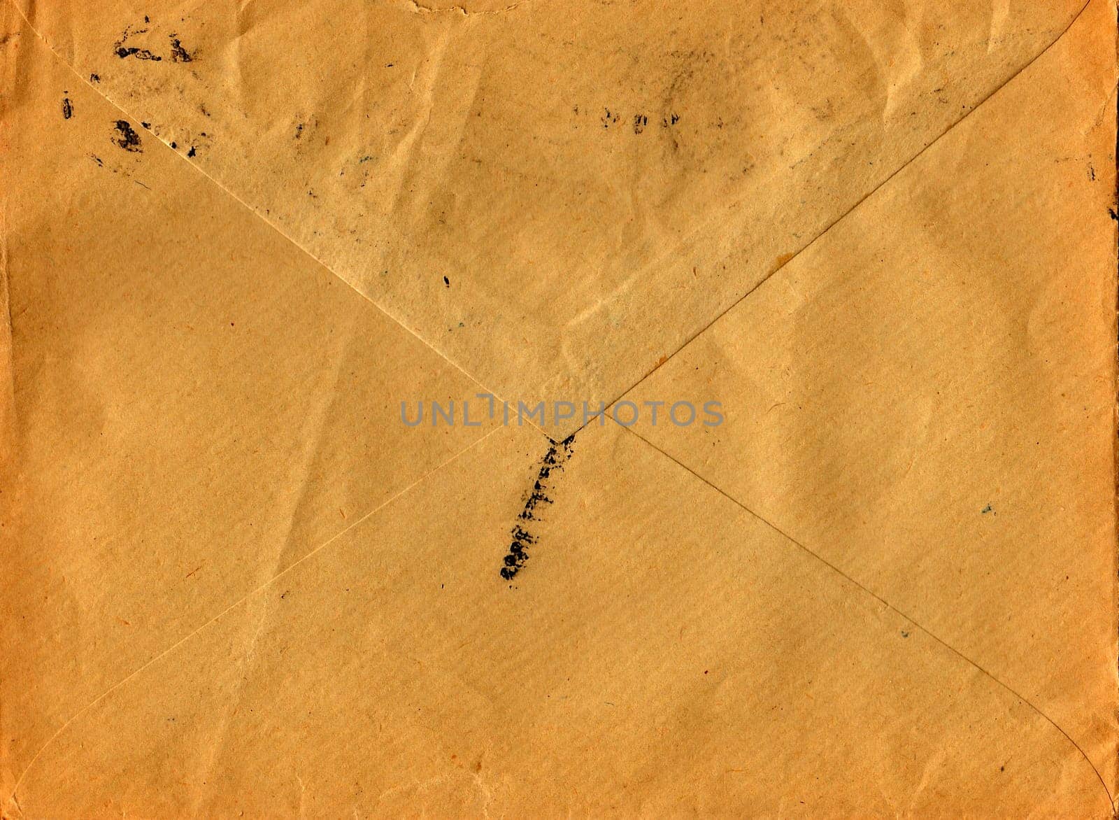 Back of an old used envelope. Rich stain and paper details. Can be used as background. by roman_nerud