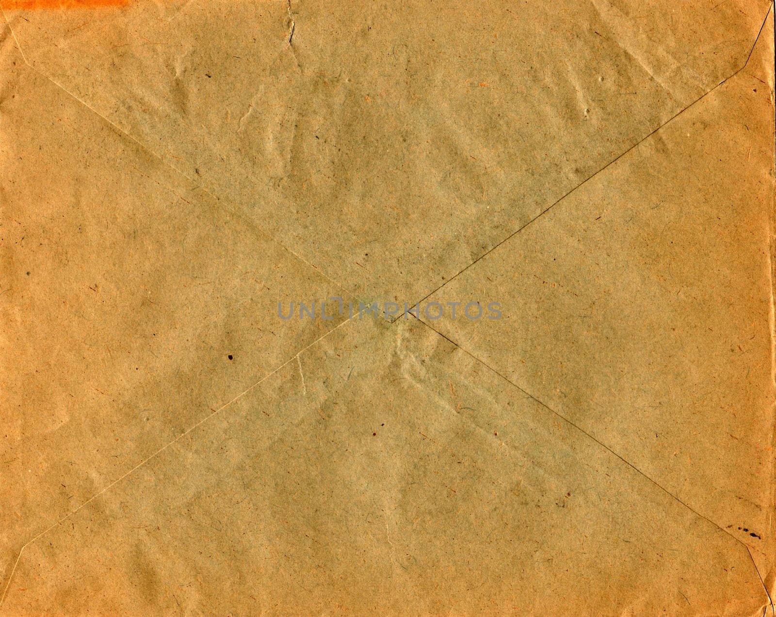 Back of an old used envelope. Rich stain and paper details. Can be used as background. by roman_nerud