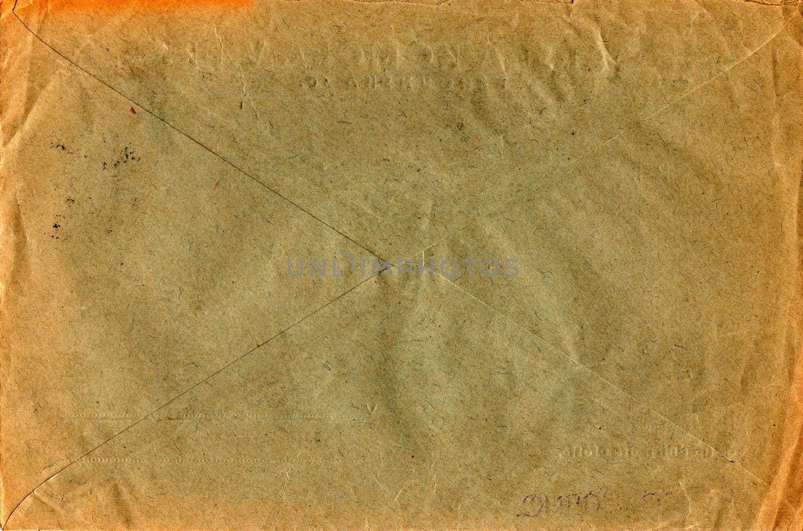 Back of an old used envelope. Rich stain and paper details. Can be used as background. by roman_nerud