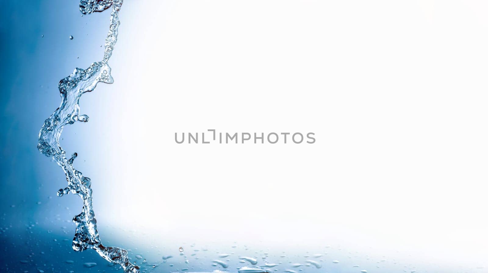 Water splashes with copy space, blue background