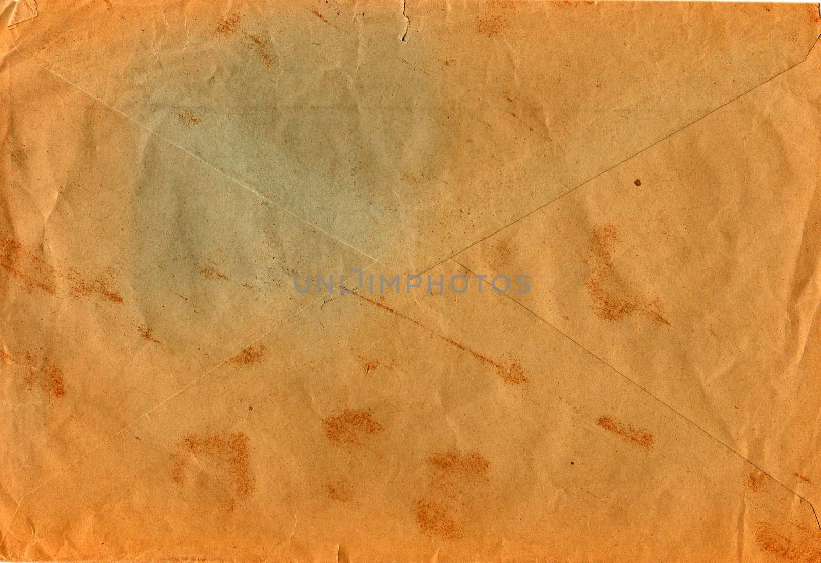 Back of an old used envelope. Rich stain and paper details. Can be used as background. by roman_nerud