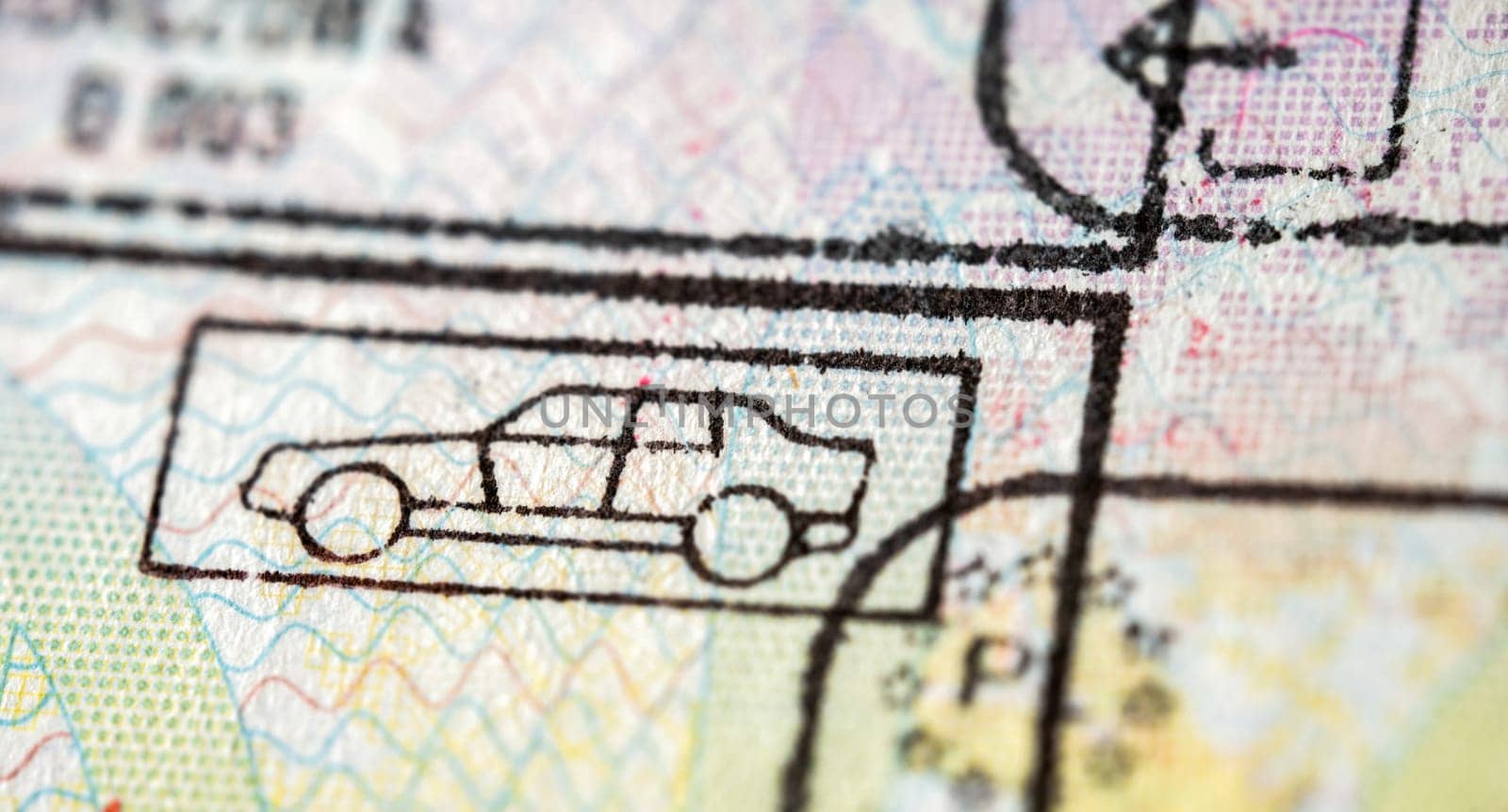 International travel visa passport stamp. Close up macro detail of European Union border control customs admission stamps with car symbol