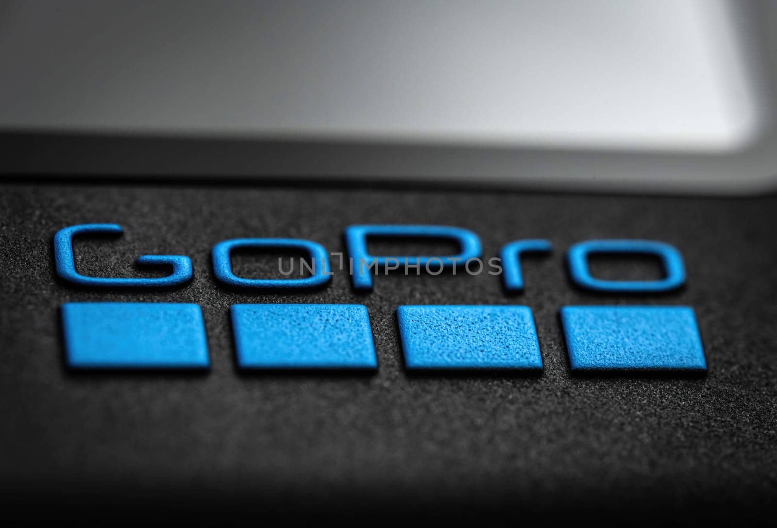 Poznan, Poland - 30 November 2022: Logo of Action camera GoPro, close up view