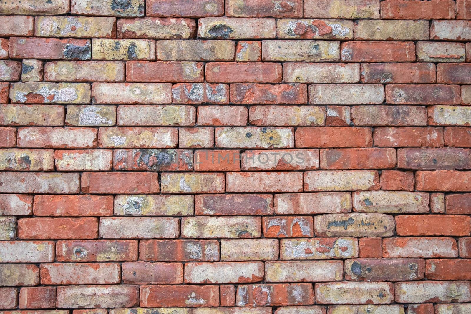 rough red stone brick wall texture background, abstract background. High quality photo