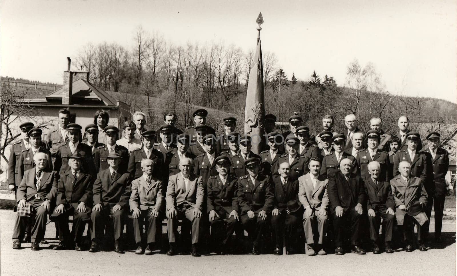 THE CZECHOSLOVAK SOCIALIST REPUBLIC - MAY 11, 1980: Vintage photo shows group of voluntary firemen (fire brigade). Black white antique photo.