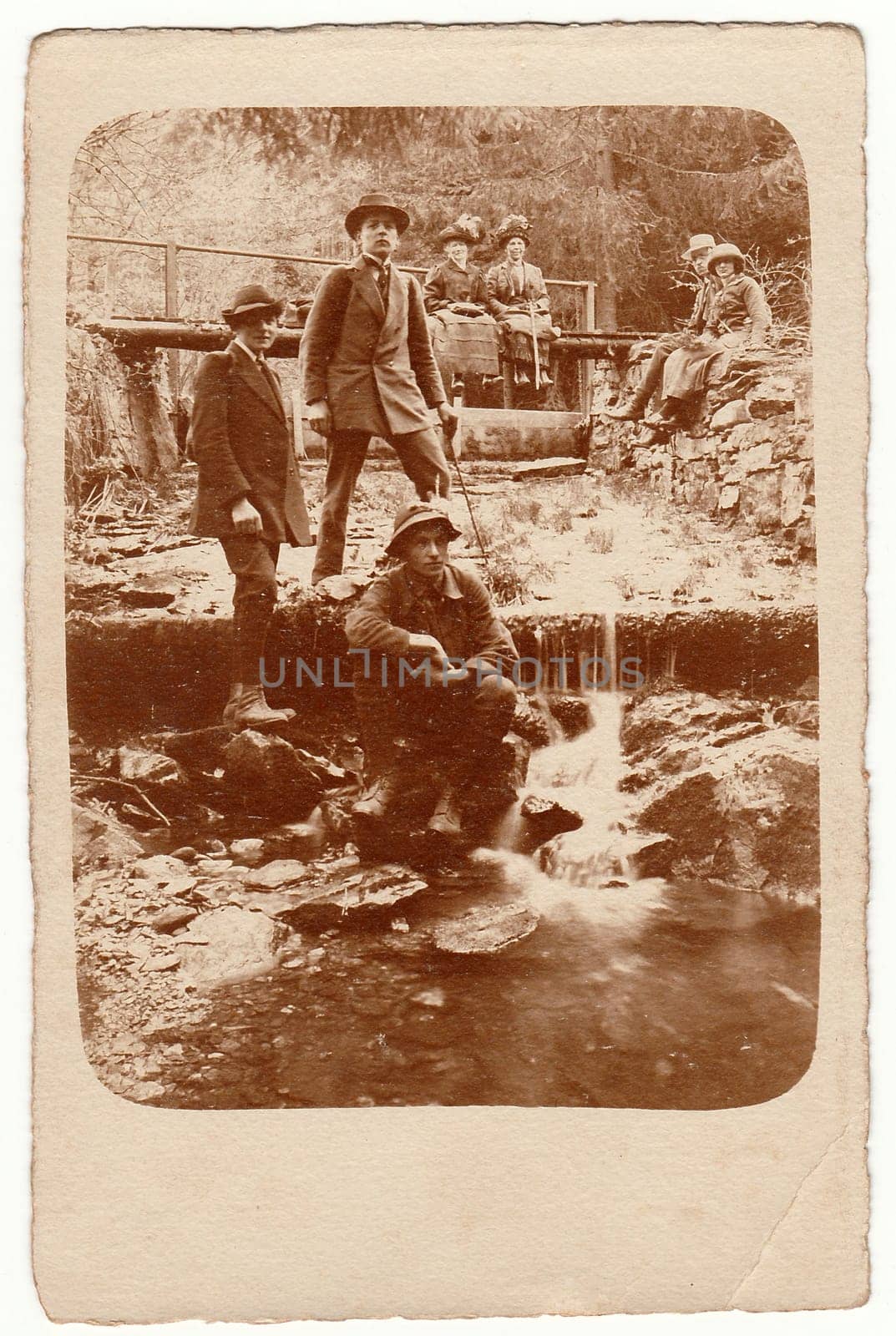 Vintage photo shows people on the summer trip during Pentecost Pfingsten . Black & white antique photography. by roman_nerud