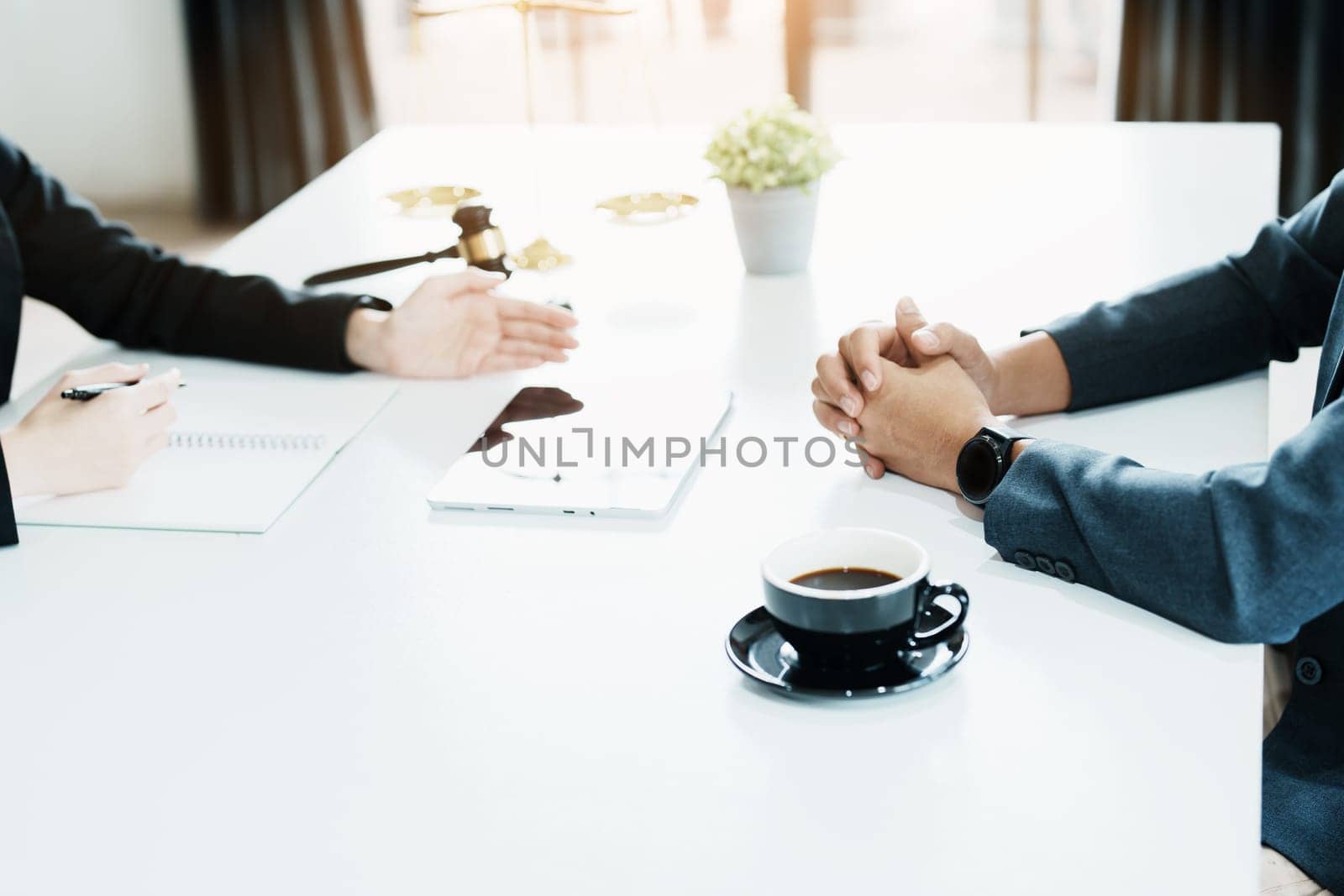 The signing of important documents between the lawyer and the client to enter into an agreement in a court case by Manastrong