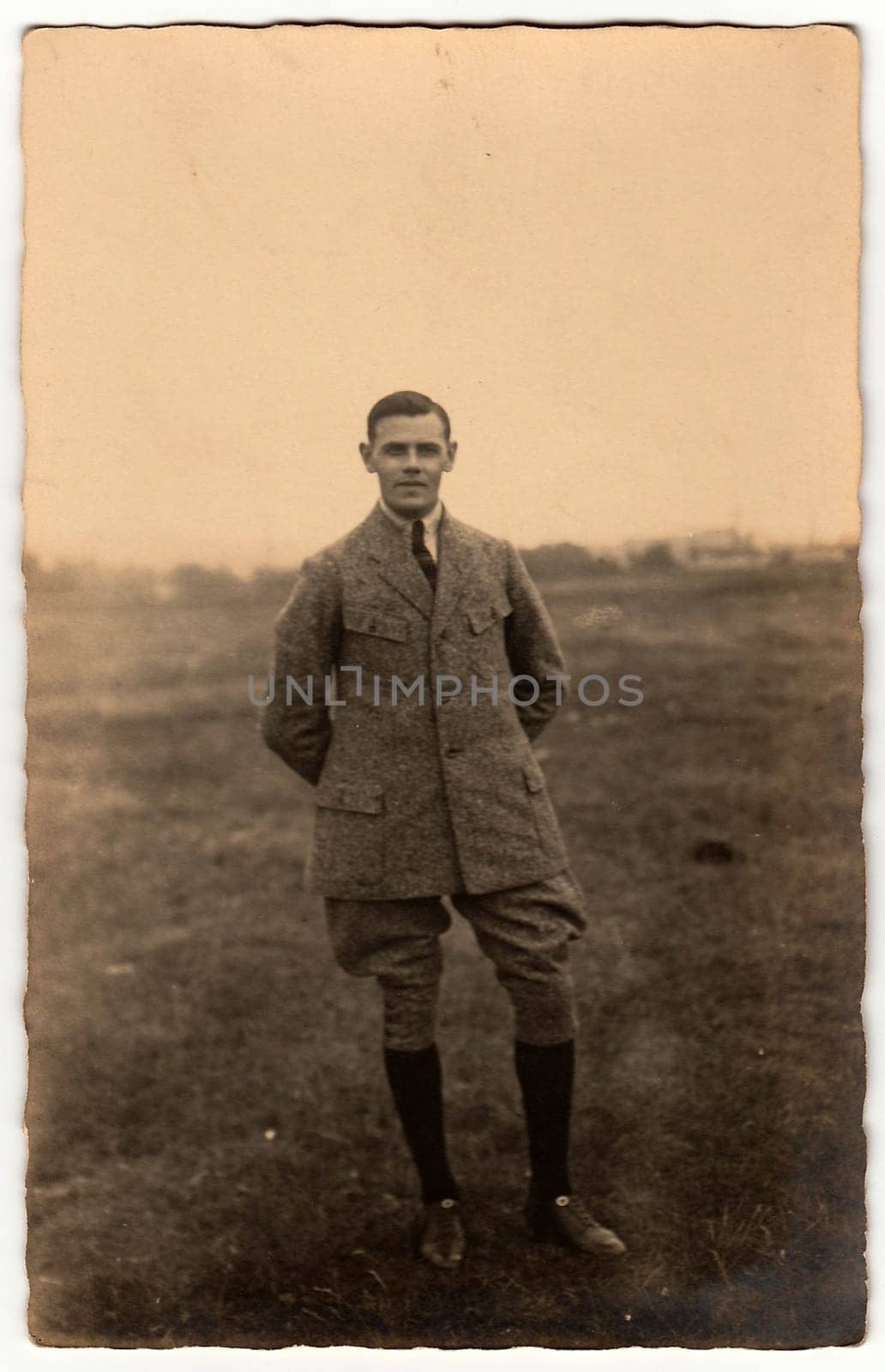 THE CZECHOSLOVAK REPUBLIC - CIRCA 1930s: Vintage photo shows man wears vintage walking clothing. Black white antique photography.