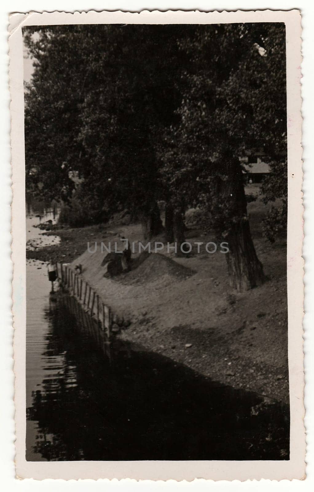 Vintage photo shows view on the river and riverside. Black white antique photo. by roman_nerud