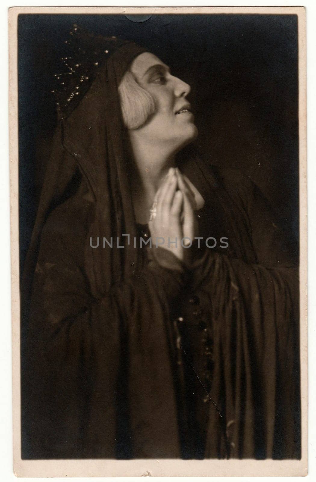 THE CZECHOSLOVAK SOCIALIST REPUBLIC - CIRCA 1960s: Vintage photo shows woman (actress) during theatre performance. Black white antique photography.