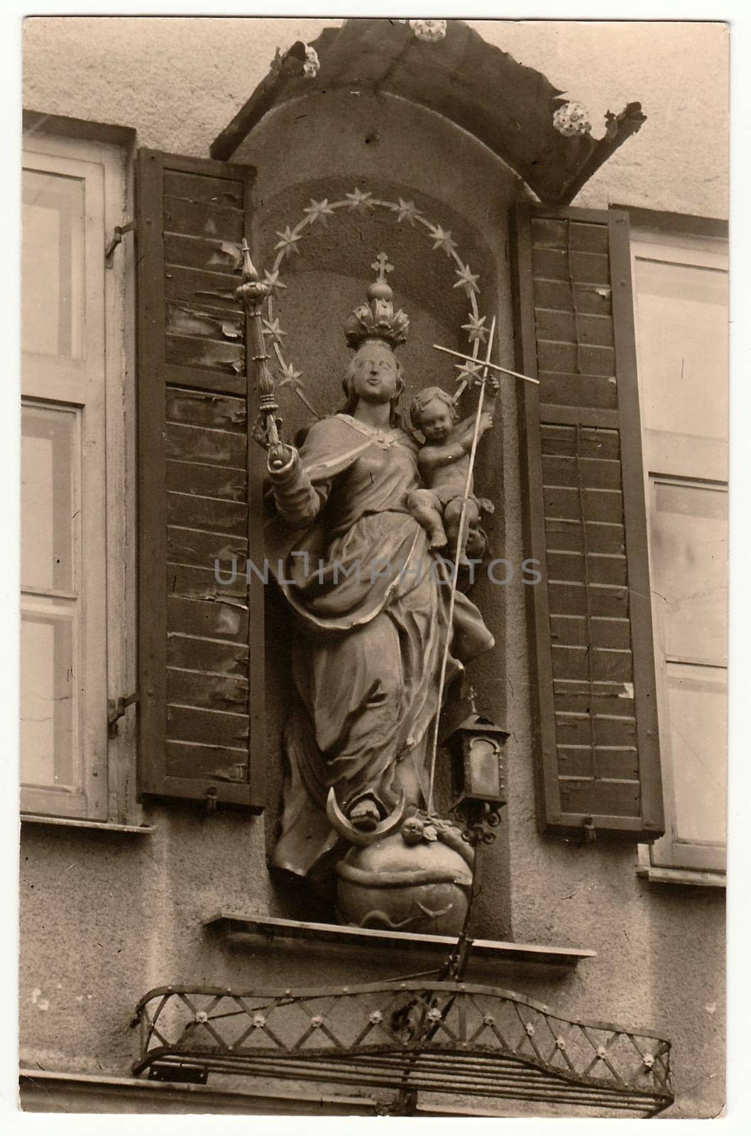 Vintage photo shows religious sculpture. Black white antique photography. by roman_nerud