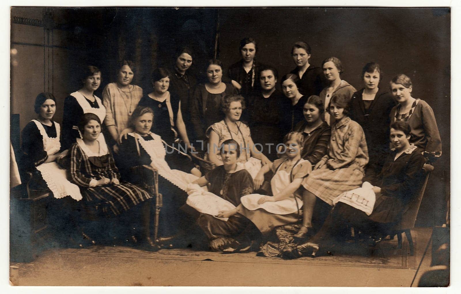 EILENBURG, GERMANY - CIRCA 1930s: Vintage photo shows young girls (schoolmates, students). Black white antique photography.