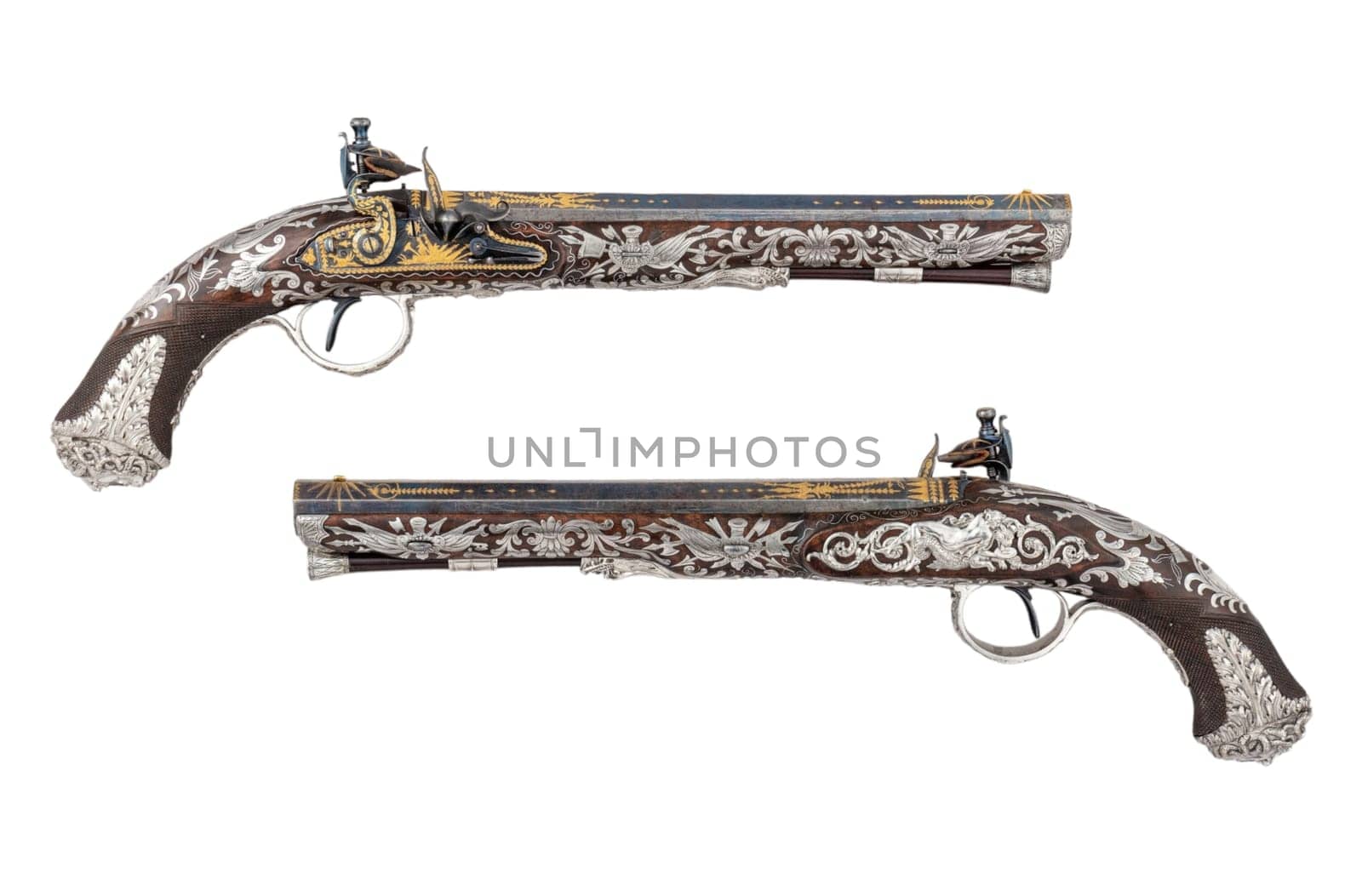 These pistols rank among the most lavishly embellished Neoclassical English firearms known. They are the masterpieces of Samuel Brunn