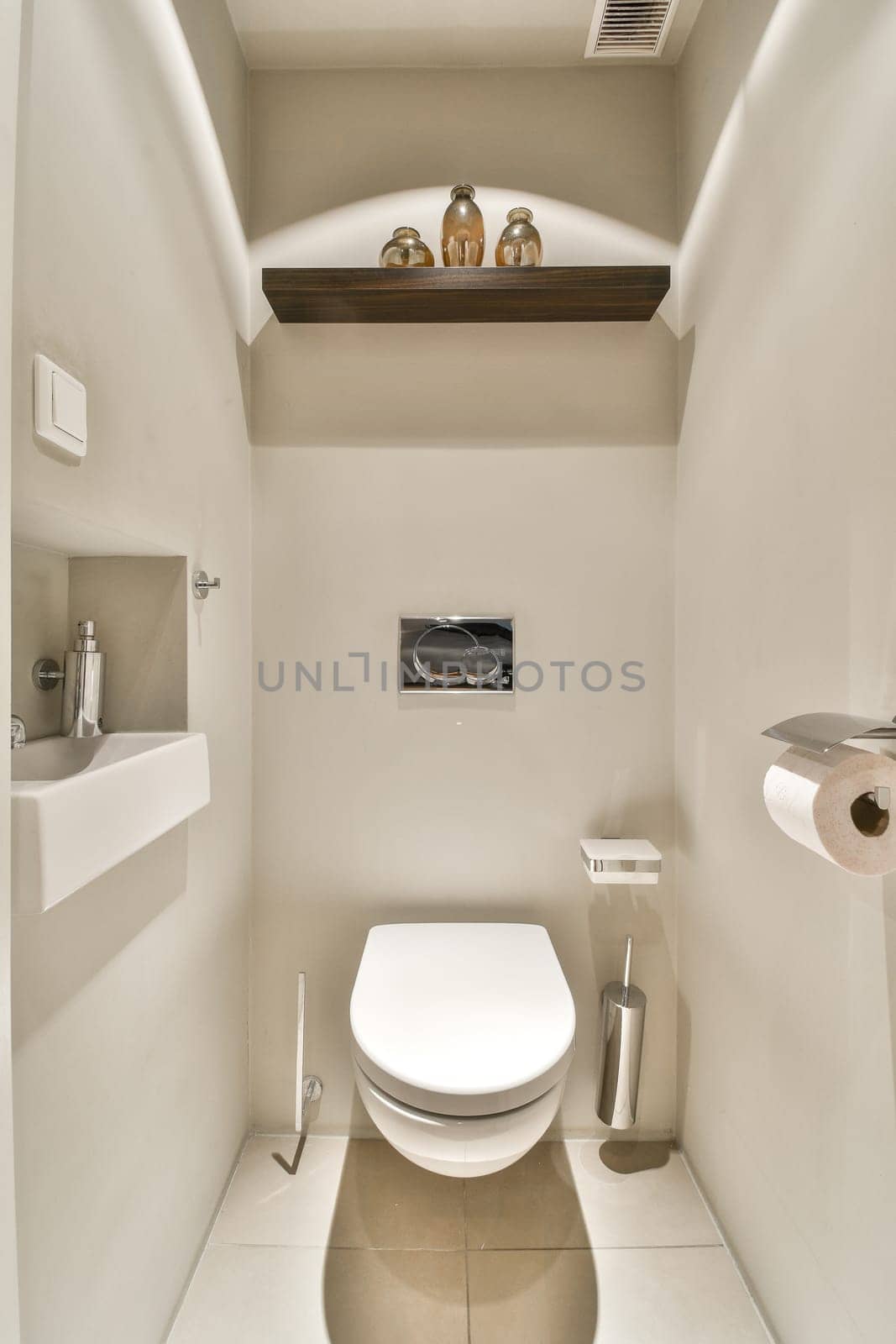 a toilet in the corner of a bathroom with shelves on the wall above it and an open window to the outside