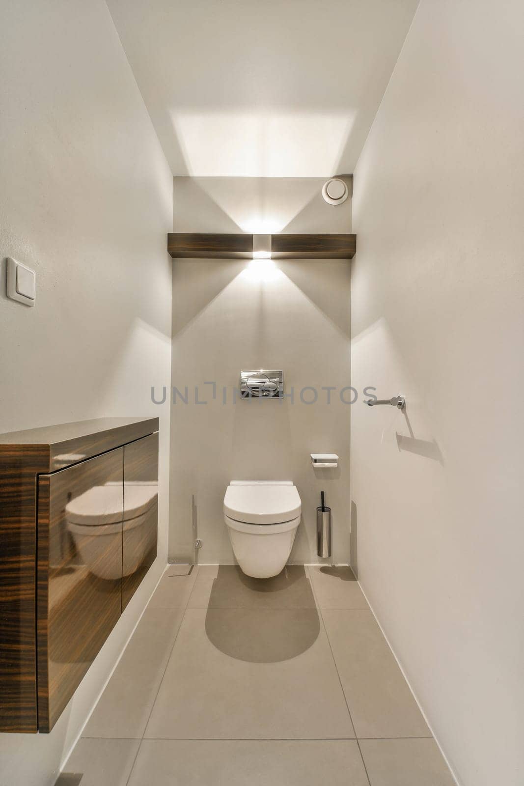 a small bathroom with a toilet and a shower by casamedia