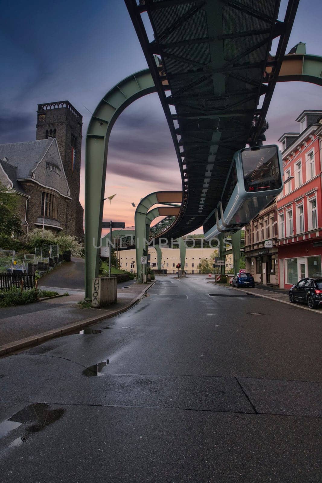 Low angle shot of a suspension railroad over Wuppertal's street in Germany
