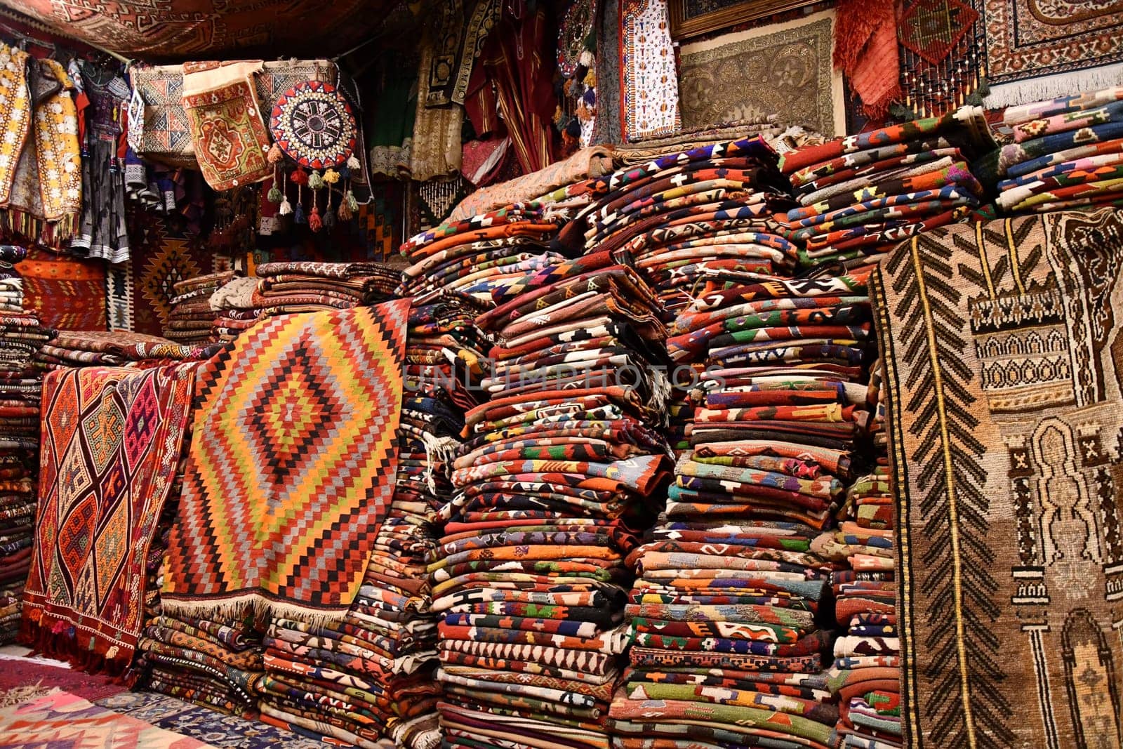Colorful, oriental carpets at a carpet dealer in Goreme, Cappadocia, Turkey