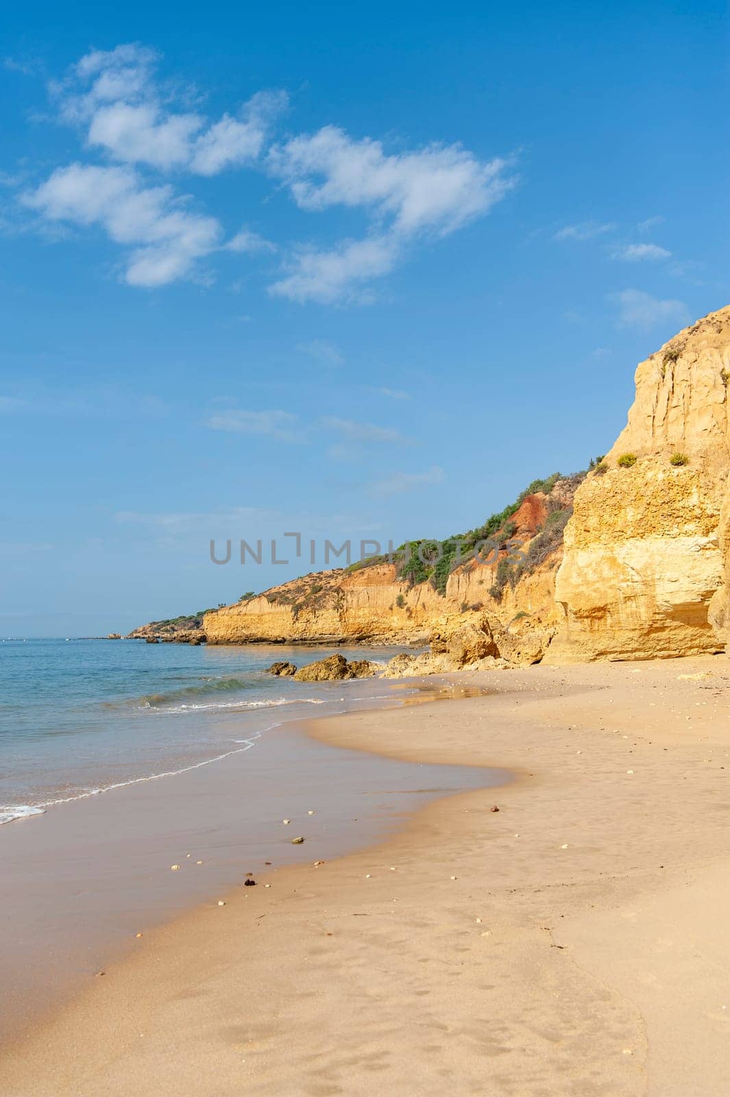 Maria Luisa beach with rock formation in Albufeira, Algarve, Portugal.