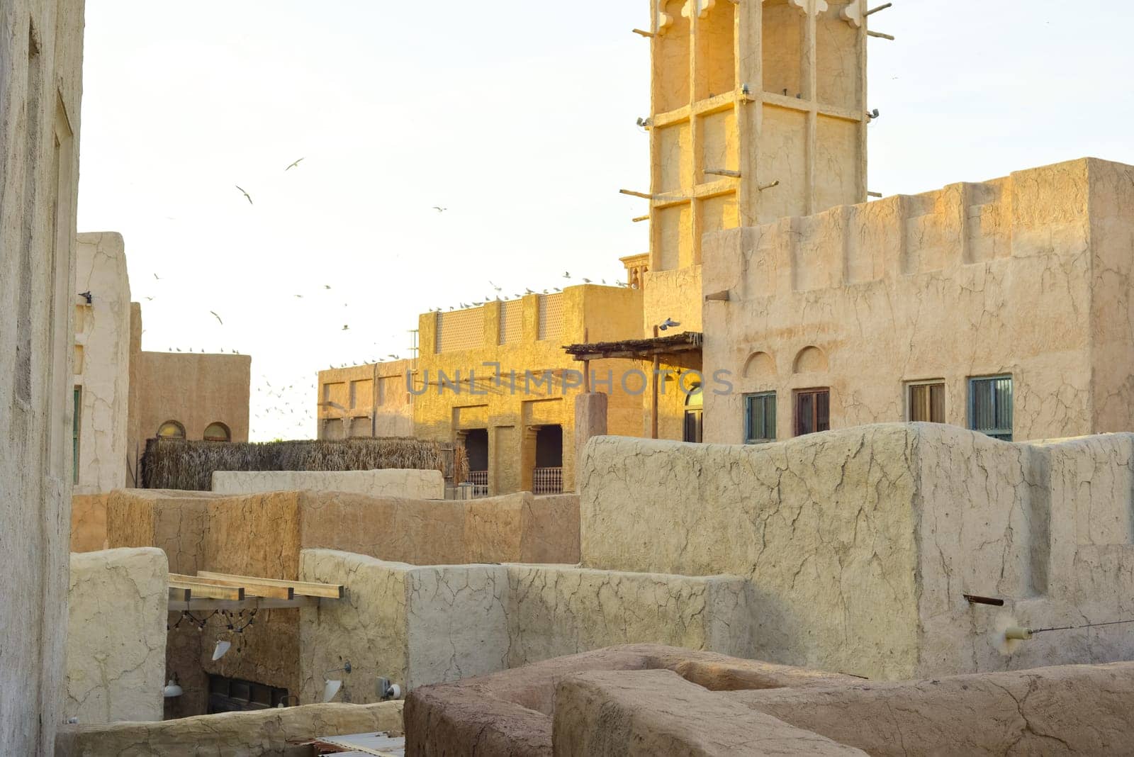 Dubai, UAE. Buildings and houses of traditional historical architecture of the old city of the Emirates in the Persian Gulf. The clay houses of Al Sifa. Deira, Burdubai by Ekaterina34