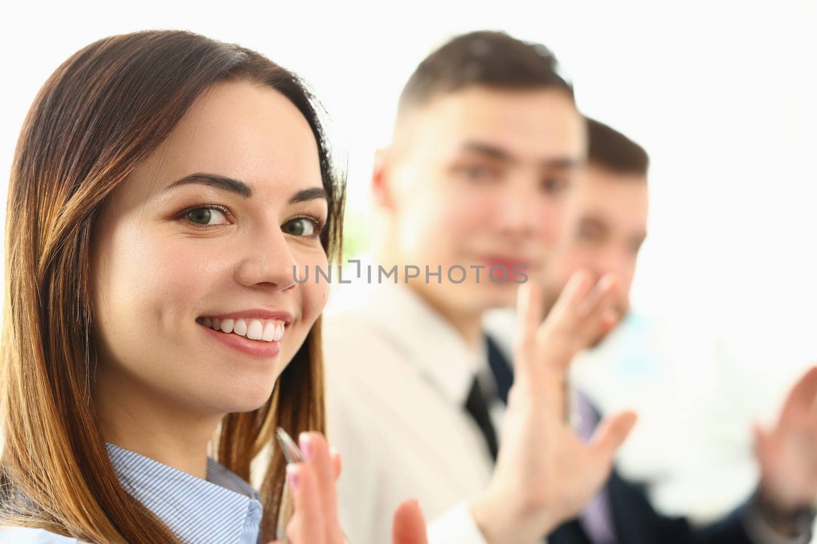 Portrait of young ambitious people at business conference by kuprevich