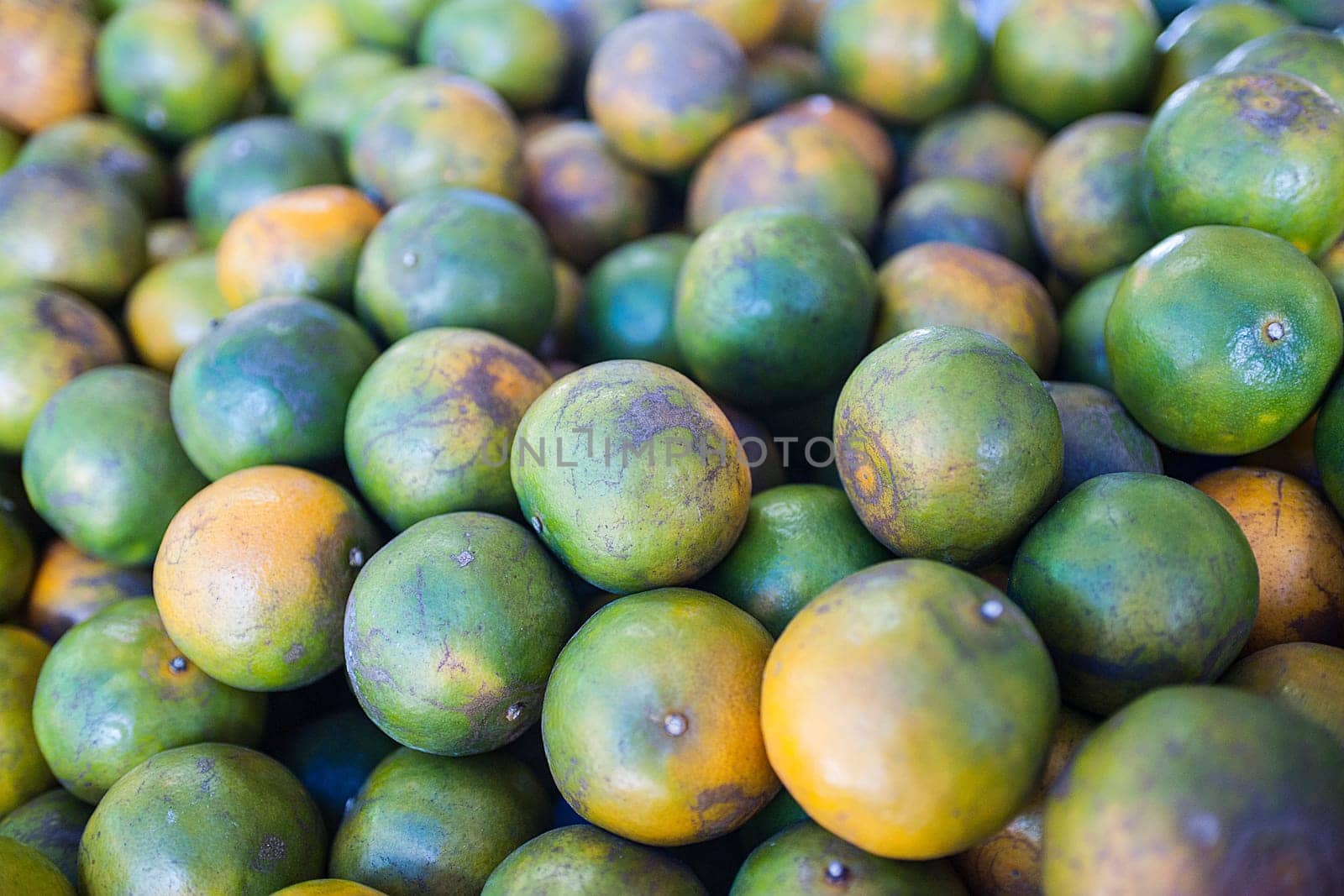 Orange fruit at the vegetable market in Phuket, Thailand