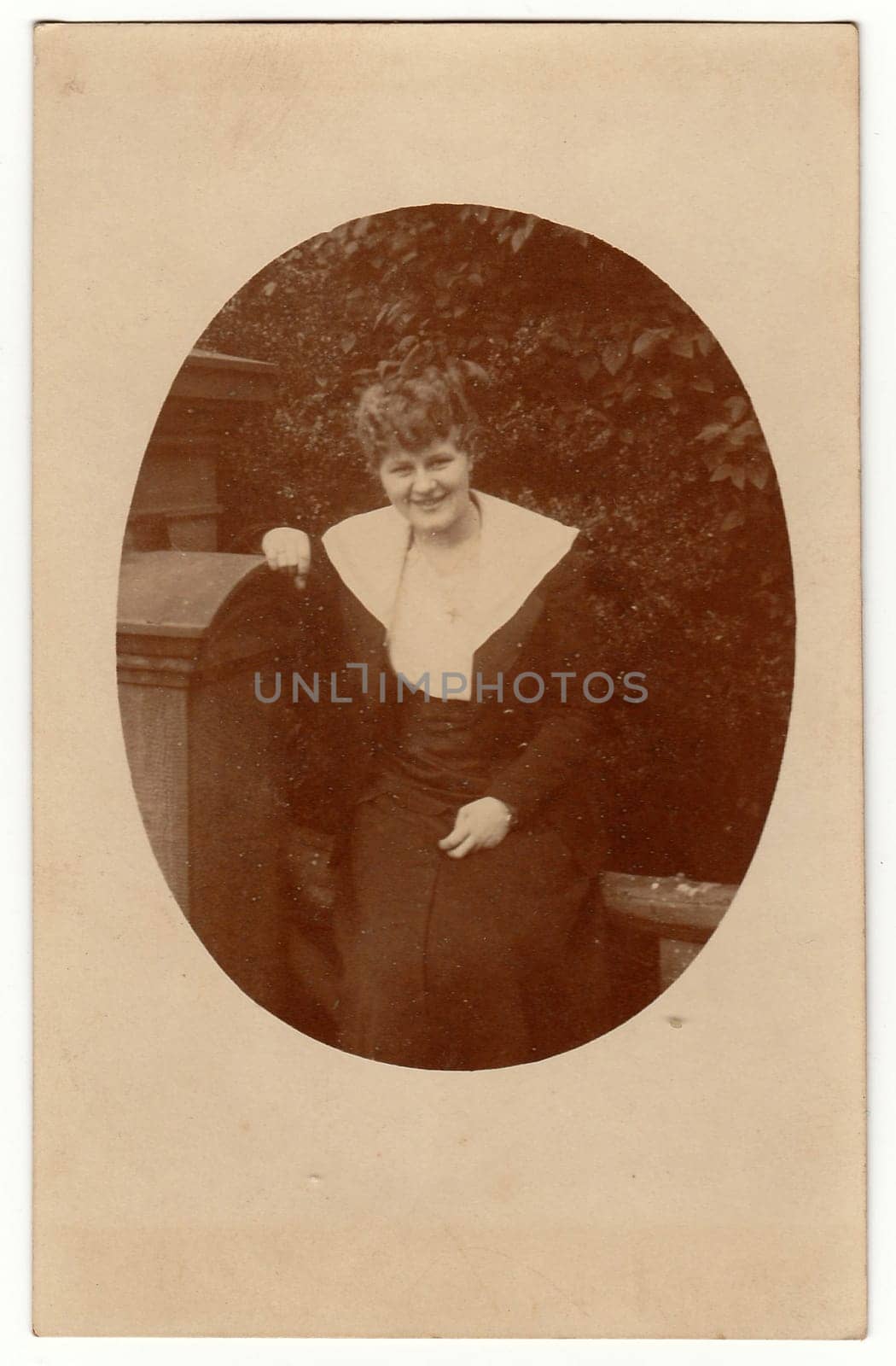 Vintage photo shows a mature woman. Photography is oval shaped. by roman_nerud