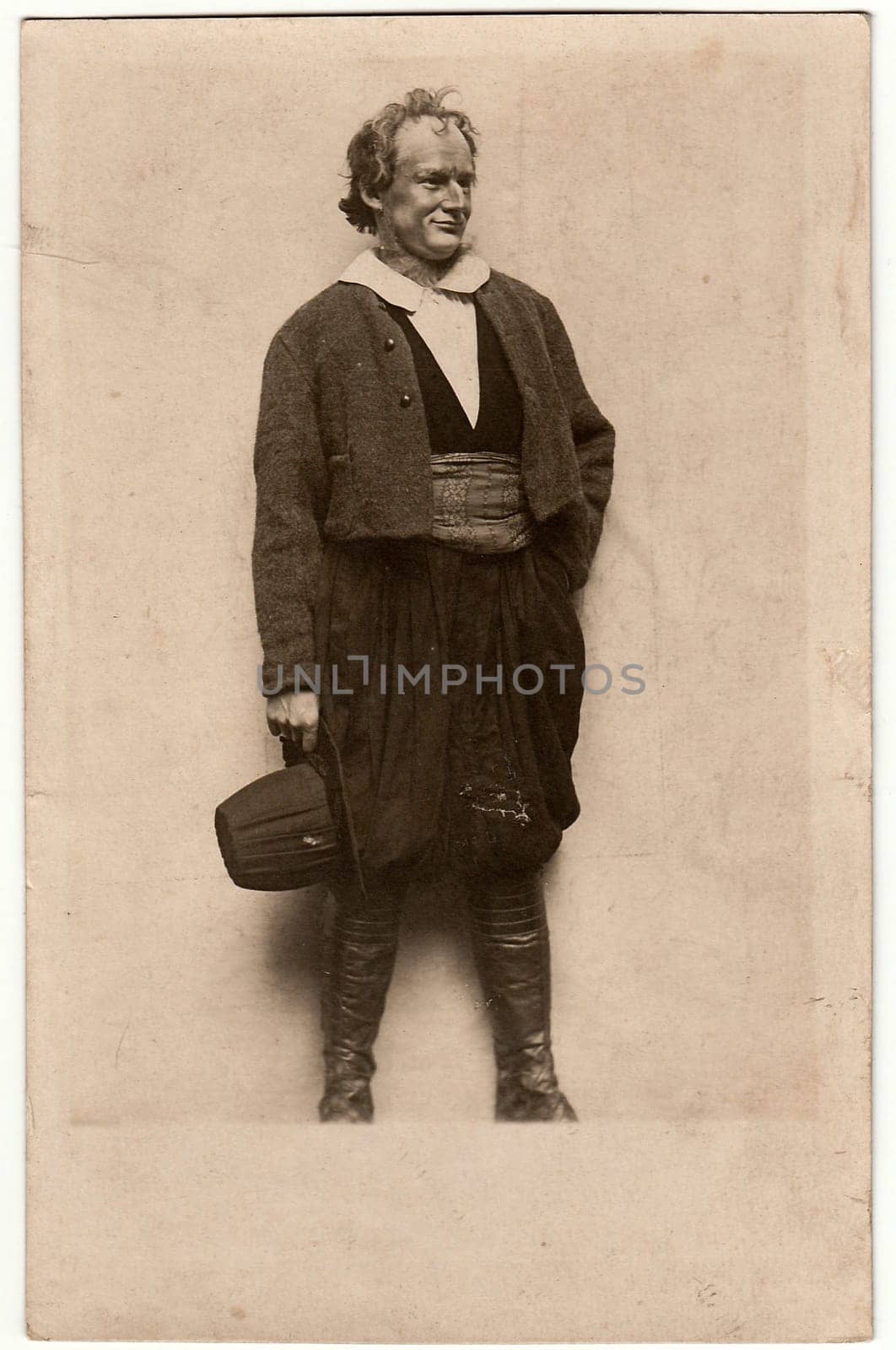 Vintage photo shows actor on theatre stage. Black white antique photography. by roman_nerud