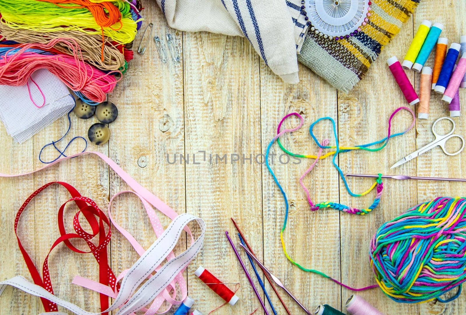 Threads and accessories for sewing and knitting. Selective focus. by yanadjana